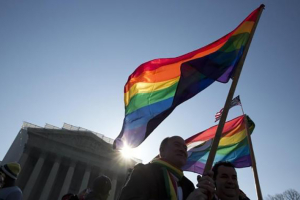 Supporters of gay marriage hold rainbow-colored flags as they rally in front of the Supreme Court in Washington March 27, 2013. (Photo: Reuters/Joshua Roberts)  <br/>