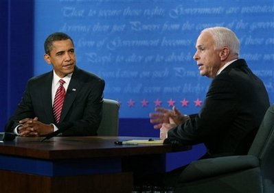 Democratic presidential candidate Sen. Barack Obama, D-Ill., looks at and Republican presidential candidate Sen. John McCain, R-Ariz., during the presidential debate Wednesday, Oct. 15, 2008, at Hofstra University in Hempstead, N.Y. <br/>(Photo: AP/Gary Hershorn, Pool)