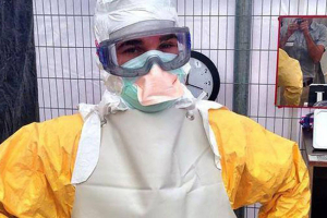 Dr. Craig Spencer while treating Ebola in Guinea. Photo: Facebook <br/>