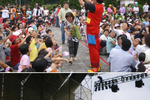 Adding color to the Taipei Franklin Graham Festival Children’s carnival, ORTV English teachers were dressed as clowns as they coordinated with the Heavenly Melody choir in a performance. <br/>(Gospel Herald) 