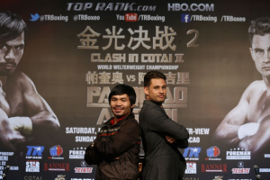 (left) Eight division boxing world champion Manny Pacquiao and undefeated former kickboxer champion Chris Algieri is seen in their promo tour in Macau. Reuters/File <br/>