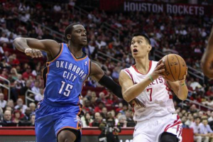 Apr 4, 2014; Houston, TX, USA; Houston Rockets guard Jeremy Lin (7) drives to the basket during the first quarter as Oklahoma City Thunder guard Reggie Jackson (15) defends at Toyota Center. Mandatory Credit: Troy Taormina-USA TODAY Sports <br/>