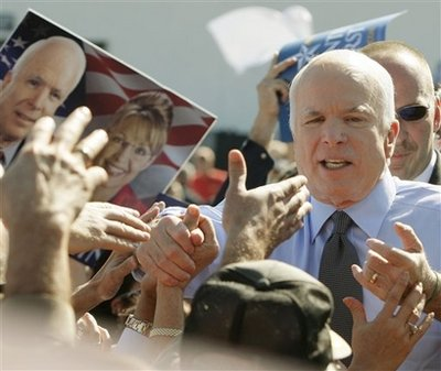 Republican presidential candidate Sen. John McCain, R-Ariz., greets supporters along a rope line at the conclusion of a campaign rally in Miami, Fla., Wednesday, Oct. 29, 2008. <br/>(Photo: AP Images / Stephan Savoia)