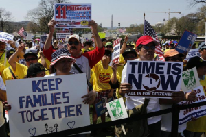People rally in favor of comprehensive immigration reform while on Capitol Hill while in Washington last year. Reuters <br/>