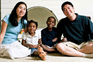 Grace (L) and Matthew (R) Huang and two of their adopted children. Photo: County of California Innocence Project <br/>