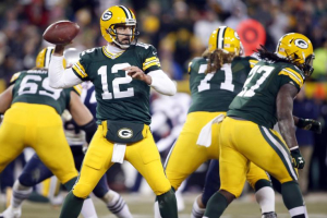 Green Bay Packers quarterback Aaron Rodgers (12) passes the ball during the second half against the New England Patriots at Lambeau Field. The Packers won 26-21. Reuters/Chris Humphreys-USA TODAY Sports <br/>