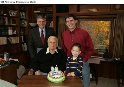 Evangelist Billy Graham celebrates his 90th birthday with family and personal staff at a private barbeque near his mountain home outside Asheville, N.C., attended by all five of his children, most of his grandchildren and many of his great grandchildren. Pictured are four generations of William F. Graham, including the evangelist and, left to right, his son, Franklin; grandson, 'Will'; and great-grandson, 'Quinn.' <br/>(Photo: Billy Graham Evangelistic Association)