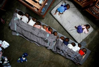 Motherless orphans and lost children rest at the Don Bosco Ngangi center in Goma, eastern Congo, Thursday Nov 13, 2008. Fighting in Congo intensified in August and has since displaced at least 250,000 people despite the presence of the largest U.N. peacekeeping force in the world. U.N. officials say both the rebels and government troops have committed crimes against civilians. <br/>(Photo: AP Images / Jerome Delay)