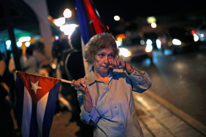 A anti-Castro Cuban exile reacts after the announcement of restoring diplomatic ties between Cuba and United States, at an area knows as 'Little Havana' in downtown Miami, Florida December 17, 2014. The U.S. and Cuba agreed on Wednesday to restore diplomatic ties that Washington severed more than 50 years ago, and President Barack Obama called for an end to the long economic embargo against its old Cold War enemy. REUTERS/Carlos Barria <br/>