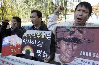 Protesters from Myanmar's National League for Democracy shout slogans at a rally calling for immediate release of their pro-democracy leader Aung San Suu Kyi and denouncing Myanmar junta's policy near the Myanmar Embassy in Seoul, South Korea, Tuesday, Nov. 4, 2008. <br/>(Photo: AP/ Lee Jin-man)