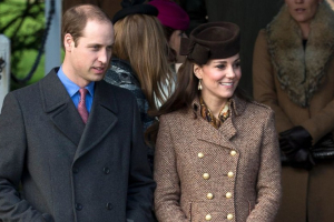 Britain's Prince William and his wife Kate Duchess of Cambridge are seen after attending the British royal family's traditional Christmas Day church service at St. Mary Magdalene Church in Sandringham, England, Dec. 25, 2014. Matt Dunham/AP Photo <br/>