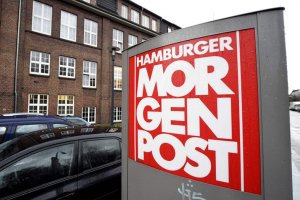 A sign for the German newspaper Hamburger Morgenpost is pictured in front of its building in Hamburg January 11, 2015. The building was the target of an arson attack and two suspects were arrested, police said on Sunday. REUTERS/Fabian Bimmer  <br/>