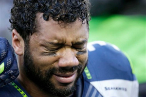 Seattle Seahawk's QB Russell Wilson reacts after his team's incredible victory over the Green Bay Packers in the NFC Championship Game on Sunday, January 18. AP Photo/David J. Phillip <br/>
