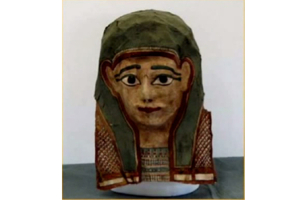 A mummy mask that is similar to the one found containing the ancient gospel text. Photo: Scott Carroll <br/>