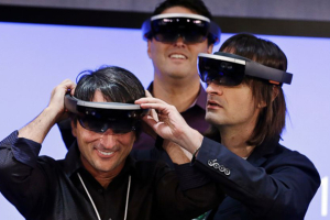 We are really in an age that is about to seriously get on board with VR, but we aren't into it yet.  The issue is that some of the major players that are out now, the HTC Vive and Oculus Rift, are just getting their feet wet and making upgrades.  The good news for those that want the Microsoft HoloLens, as it is available for purchase now, albeit expensive.  Then there is a less expensive headset from Samsung known as the Galaxy Gear VR.  This is the latest Virtual Reality News with release dates, prices, and upgrades from the biggest companies. Microsoft announced the HoloLens at this year's big Windows 10 event. Photo: Elaine Thompson/AP <br/>