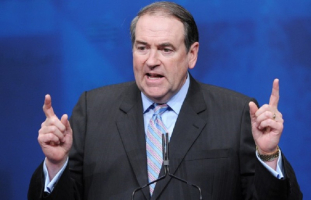 Former Arkansas Governor Mike Huckabee speaks during an address to the 39th Conservative Political Action Committee. MANDEL NGAN - AFP/GETTY IMAGES) <br/>