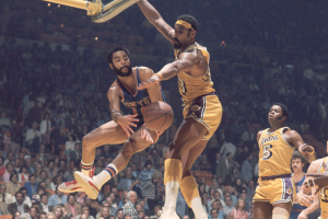 NBA legend Walt 'Clyde the Glide' Frazier is seen passing the ball during his prime while playing for New York Knicks.  <br/>