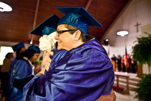 Kelly Gissendaner embraces fellow graduate of Crossroads Theological Seminary. Photo: Ann Borden <br/>