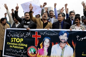 Pakistanis protest the violent killing of a Christian couple falsely accused of blasphemy. <br/>
