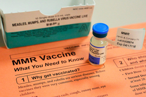 A vial of measles, mumps and rubella vaccine and an information sheet is seen at Boston Children's Hospital in Boston, Massachusetts February 26, 2015. REUTERS/Brian Snyder  <br/>