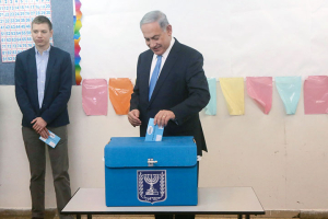 Israeli Prime Minister Benjamin Netanyahu votes on Tuesday. Credit: Marc Israel Sellem/POOL/Flash90. <br/>