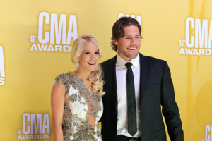 Country star Carrie Underwood pictured with her husband, professional athlete Mike Fisher. The two welcomed a son in February 2015. Reuters <br/>